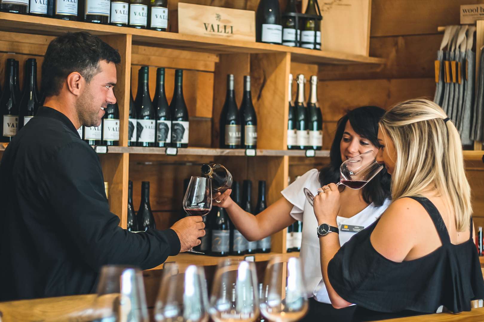 Couple tastes wines with a Sommelier