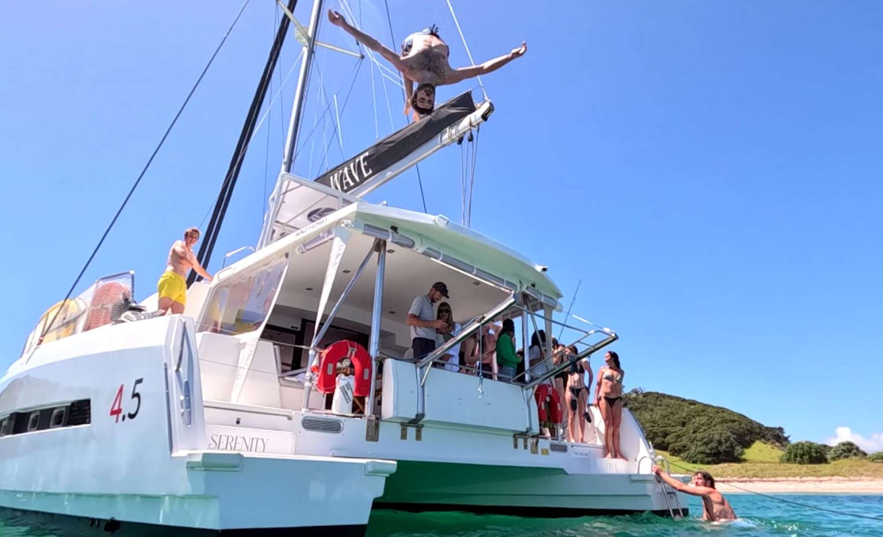 Jumping off and swimming of Silverwave private charter in the Bay of Islands private day charter