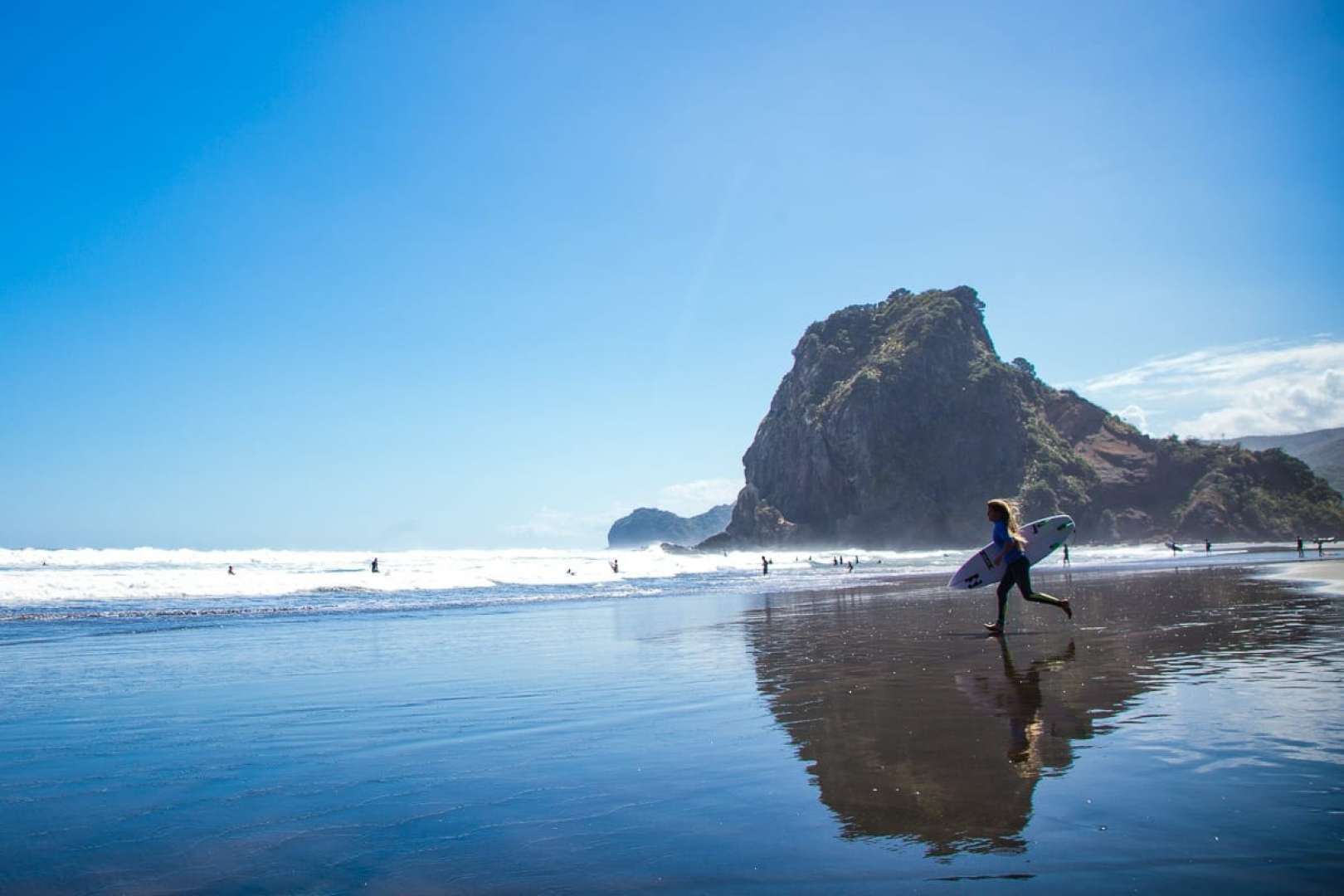 Piha Beach, New Zealand’s most famous surf beach, known for its dramatic black iron-sand